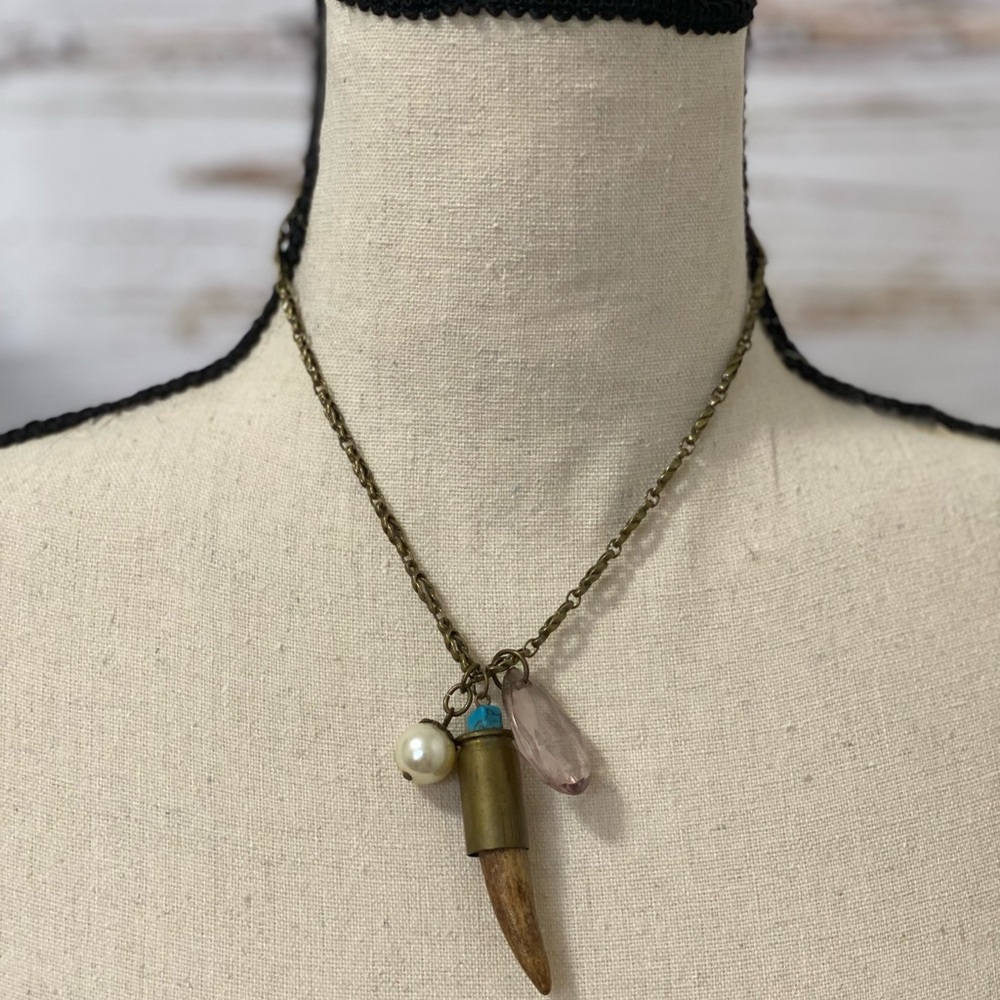 Handmade necklace, with deer antler in cased brass bullet